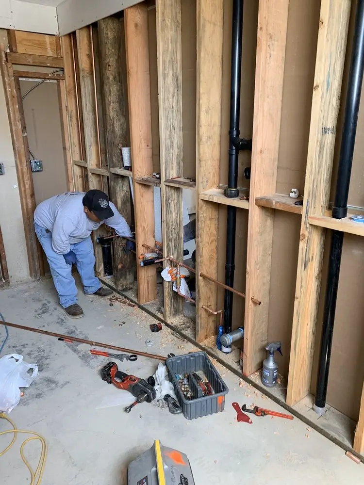 Commercial rough-in plumbing for Water Heater Replacement in Forest Hills